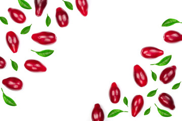 Red berries of cornel or dogwood decorated with green leaves isolated on white background with copy space for your text. Top view. Flat lay