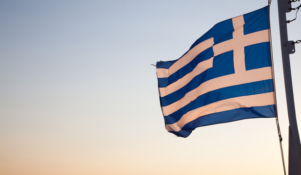 Fototapeta greece flag at sunrise