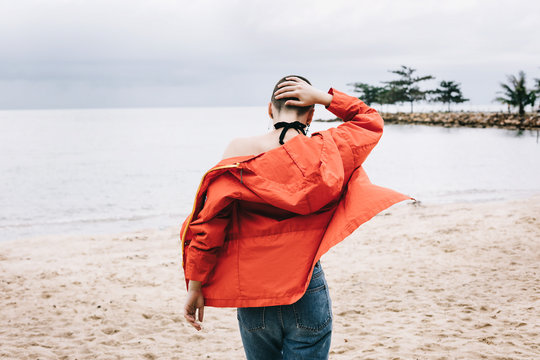 Back view of woman in a beach