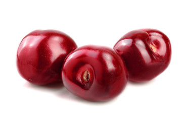 Sweet red cherries isolated on white background macro