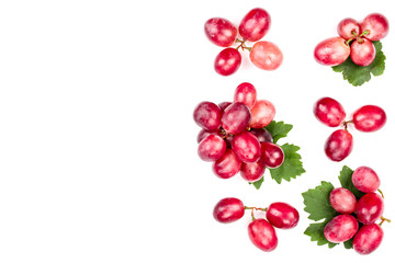 pink grapes isolated on the white background with copy space for your text. Top view. Flat lay pattern