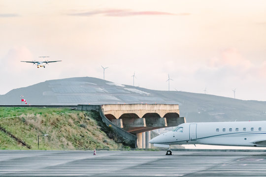 Madeira airport runway and windmills