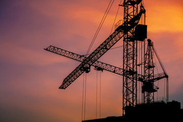 construction crane at sunset close-up
