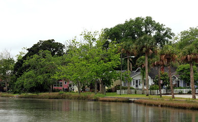 Fototapeta na wymiar Florida. Calm neighborhood on the shore in rainy day