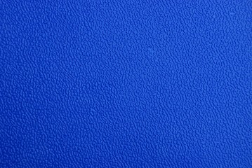 blue dark texture from a piece of plastic wall