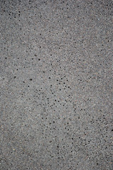 Sand on the beach with small holes