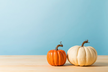 Collection of autumn pumpkins on a blue background