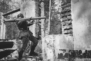 German Wehrmacht Infantry Soldier In World War II Open Fire From