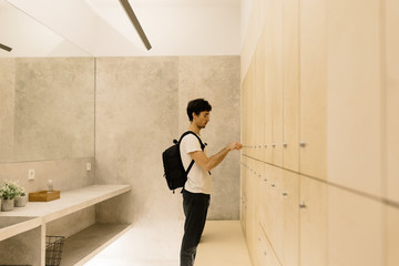 Man locking section in dressing room