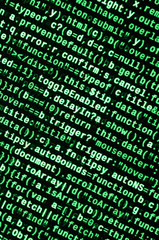 Big data and Internet of things trend. IT specialist workplace. Website HTML Code on the Laptop...