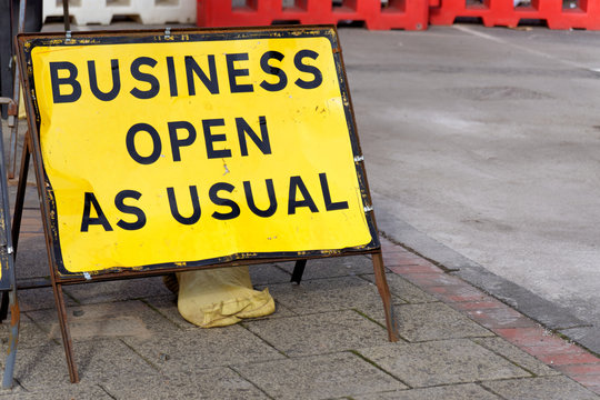 business open as usual sign