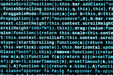 Writing programming code on laptop. Digital binary data on computer screen