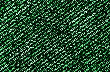 Writing programming code on laptop. Digital binary data on computer screen