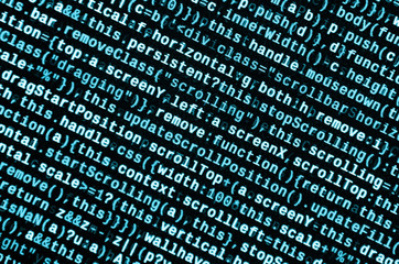 Writing programming code on laptop. Digital binary data on computer screen