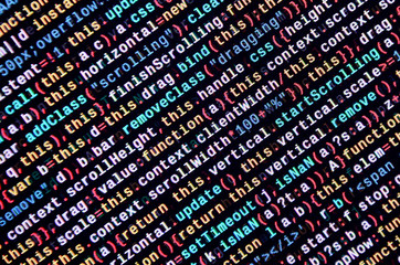 JavaScript code in text editor. Coding cyberspace concept. Screen of web developing code