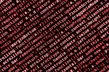 Writing programming code on laptop. Digital binary data on computer screen