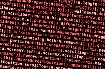 Writing programming code on laptop. Digital binary data on computer screen