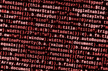 Writing programming code on laptop. Digital binary data on computer screen