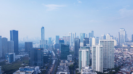Naklejka na ściany i meble Jakarta city under blue sky