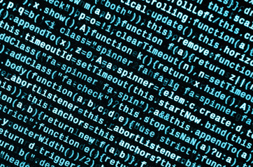 Writing programming code on laptop. Digital binary data on computer screen