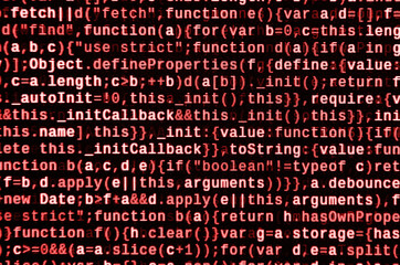 Writing programming code on laptop. Digital binary data on computer screen