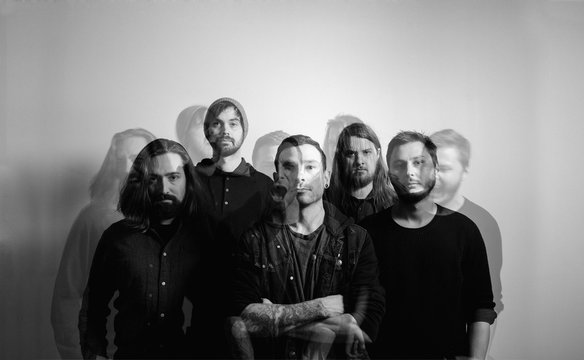 Double exposure of five member band on seamless background