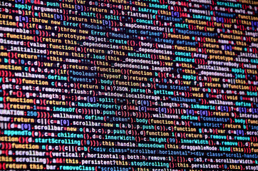 Software developer programming code on computer. Abstract computer script source code