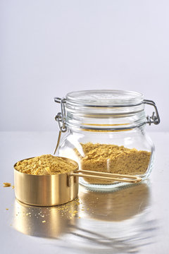 Nutrional Yeast, Used in Vegan and Dairy-Free Cooking as a replacement for cheese/dairy flavor.