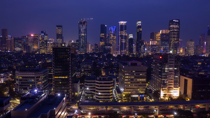 Fototapeta na wymiar Modern skyscrapers in Sudirman CBD at night