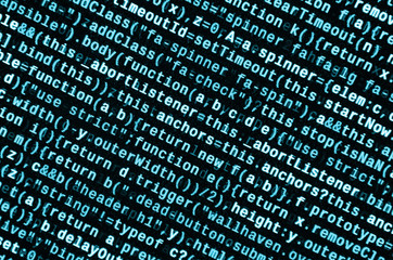 Writing programming code on laptop. Digital binary data on computer screen