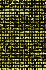 Writing programming code on laptop. Digital binary data on computer screen
