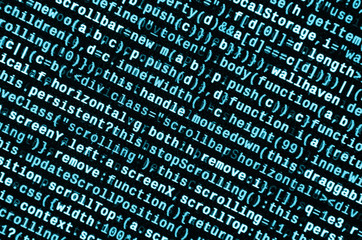 Big data and Internet of things trend. IT specialist workplace. Website HTML Code on the Laptop...