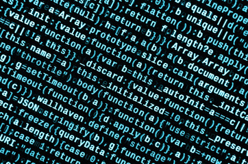 Big data and Internet of things trend. IT specialist workplace. Website HTML Code on the Laptop...