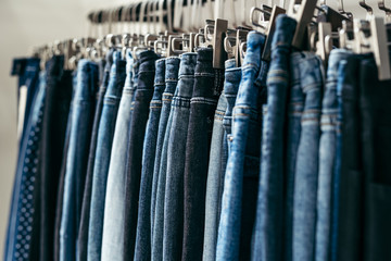 Blue jeans hanging in store