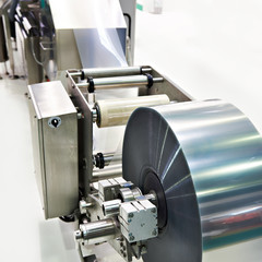 Roll of packaging film on machine food factory