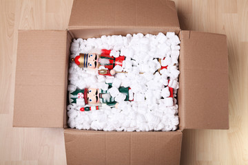 Christmas Nutcrackers in a box full of placking peanuts