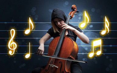 Fototapeta premium Young handsome cellist playing with music sheet background