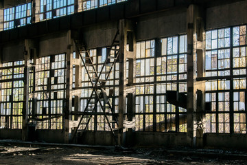 Abandoned ruined building of an old factory house broken walls non-residential premises for design background