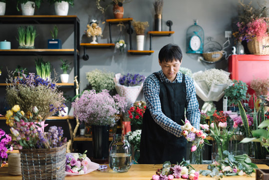 Floral shop owner working in the flower shop