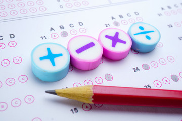 Math symbol and pencil on Answer sheet background : Education study mathematics learning teach...