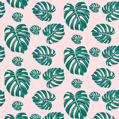 Beach seamless pattern wallpaper of tropical dark green leaves of monstera trees of paradise on a light pink background