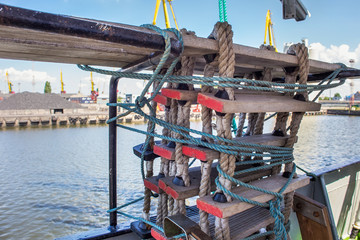 Rope-wood ladder on a sailing ship.