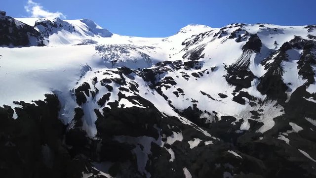 snowy volcano and blue sky