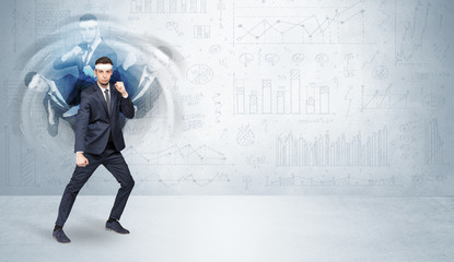 Fototapeta premium Young businessman in suit fighting with chart and report concept 