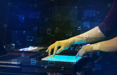 Hand remixing music on midi controller with play music and multimedia  concept
