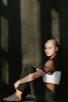 Studio portrait of bald woman