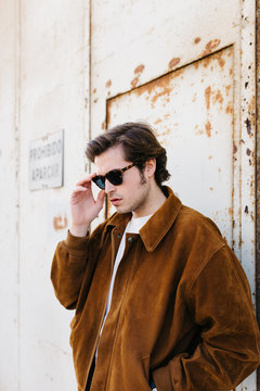 Stylish male model in sunglasses