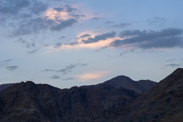 cold sky over the mountains in the evening