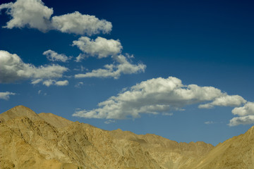 beautiful dark blue sky above the sandy mountain