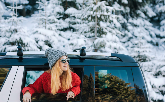 Woman Enjoying Winter Road Trip